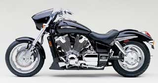 Honda plans a host of accessories available for its new flagship cruiser, including a custom detachable windshield, sleek leather saddlebags and a passenger backrest and luggage rack for those raring to hit the road. To give the big gun a street-fighter look there is this hot-looking, color-matched cowl system for headlight and radiator (sold separately). Thirteen Honda-built billet parts are already on their way to your dealer -- from a timing and crankshaft cover set to a billet dipstick. You can change out some of the plastic parts with chrome and add chrome 

floorboards or a light bar to the beast. Of course this is only the beginning. Aftermarket manufacturers are scurrying to build bits for this bike now that it's finally on the street. As the customizing platform headlining the awakening of a new performance era for cruisers, the VTX will not be wanting for parts. 